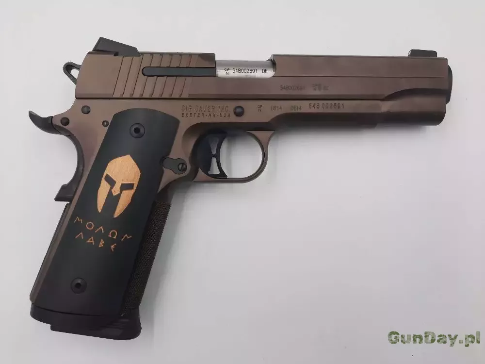 Sig-Sauer-1911-kal-45-auto-1-scaled.jpg