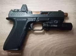 Shadow Systems DR920 Elite z celownikiem Trijicon RMR 3,25 MOA i latarką Surefire x300 UA
